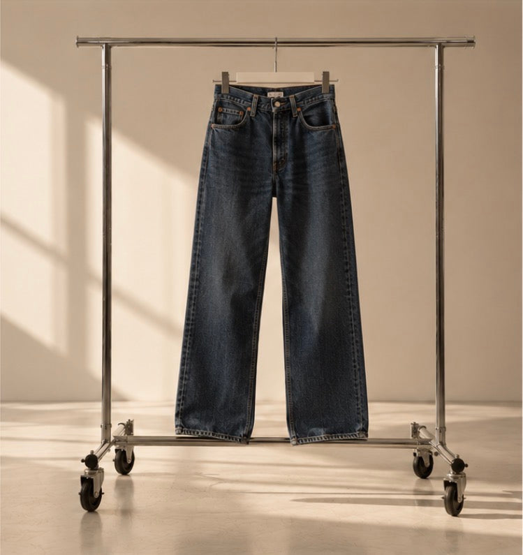 1996 vintage Levi's straight jeans hanging on a rail