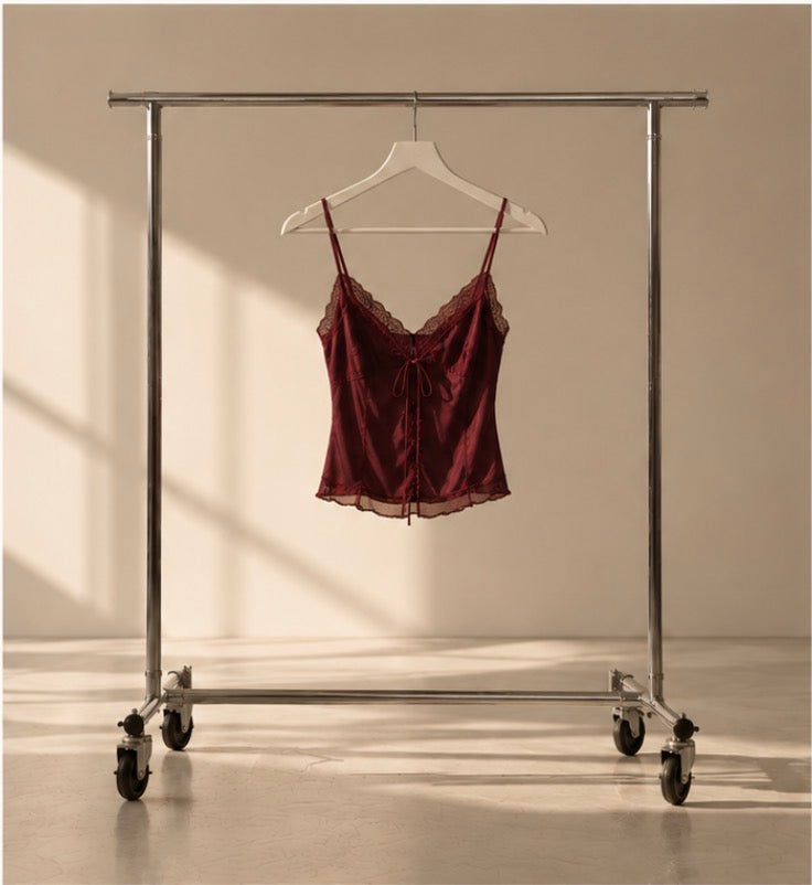 2001 Miss Sixty red lace camisole hanging on a rail